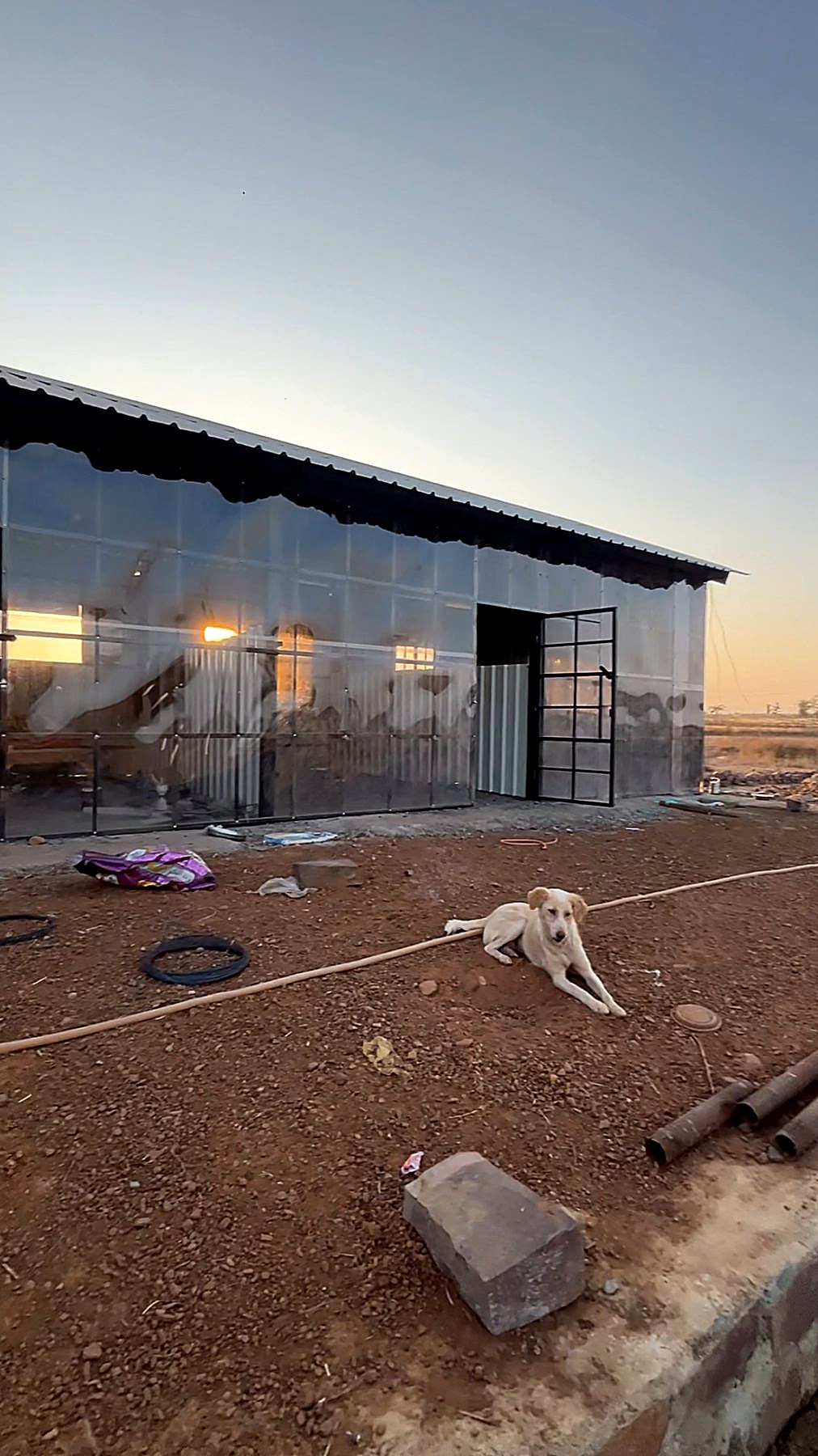 The shelter at sunset — translucent walls already in place